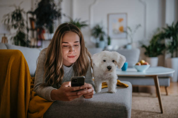 istock Woman relaxing on sofa 1357883793