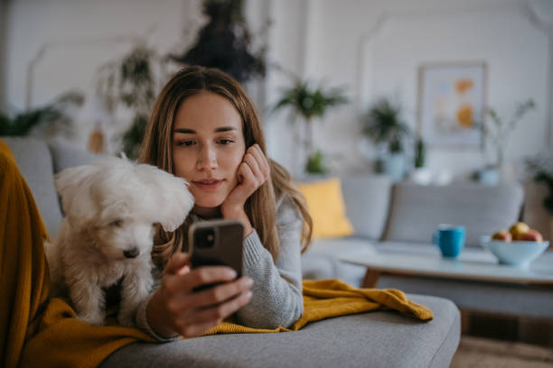 istock Woman relaxing on sofa 1357884769