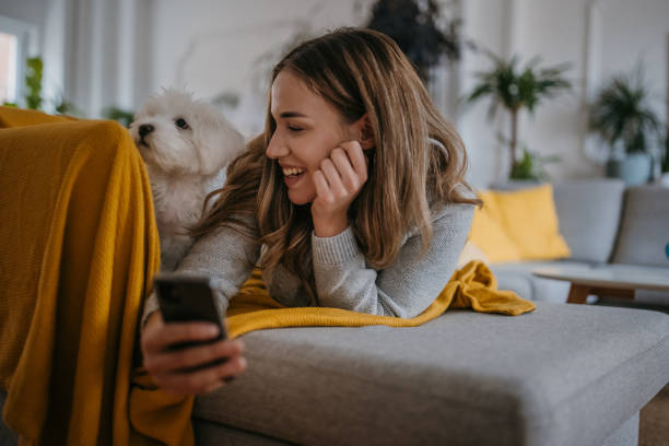 istock Woman relaxing on sofa 1357884994