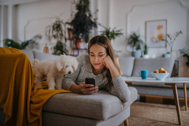 istock Woman relaxing on sofa 1357885079