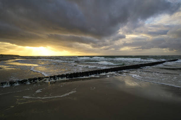 istock view over the bunes into the baltic sea at sunset. 1357886104