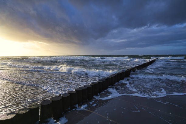 istock view over the bunes into the baltic sea at sunset. 1357887281