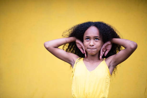 istock Portrait girl thinking. 1357888663