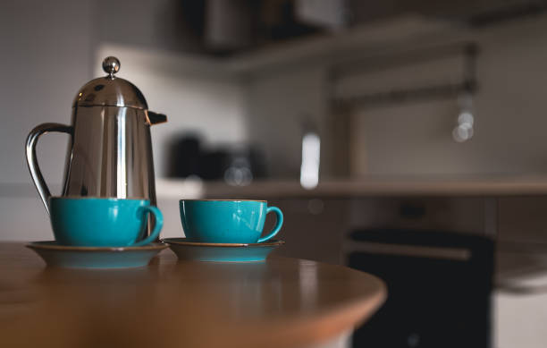 istock Teapot and two cups on the table in the morning. 1357896268