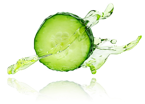 Slice of cucumber with flowing water wave isolated on white background.