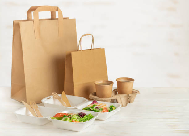https://media.istockphoto.com/id/1357896488/photo/food-delivery-paper-bags-lunch-boxes-with-salad-and-coffee.jpg?s=612x612&w=0&k=20&c=zUjpMz-IEWUArCIOejjzJ7rXWfVxOTkwk3MH9ke7kn0=