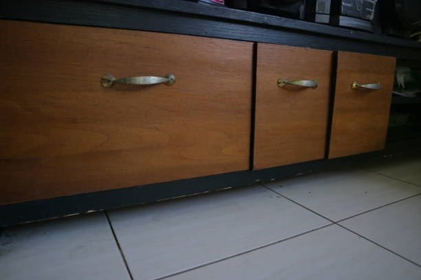 istock wooden television table with multiple curtains photo 1357897868