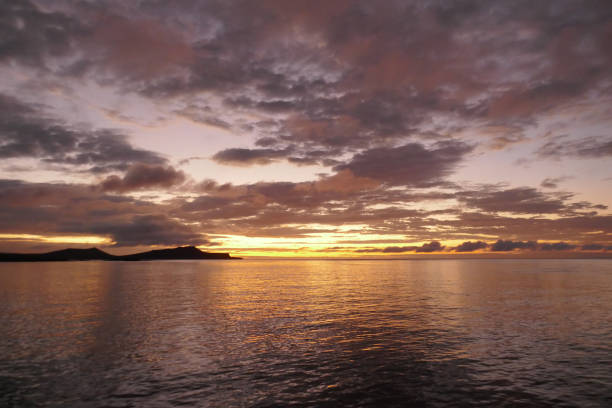 Magical sunsets close the island of Floreana, Galapagos
