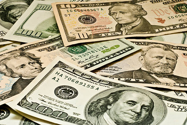 istock background of dollars 135790161