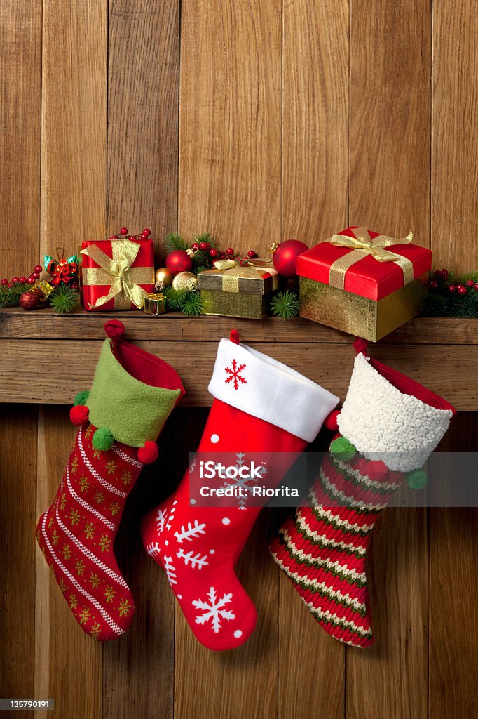 Christmas stockings Christmas stockins and gifts Christmas Stocking Stock Photo