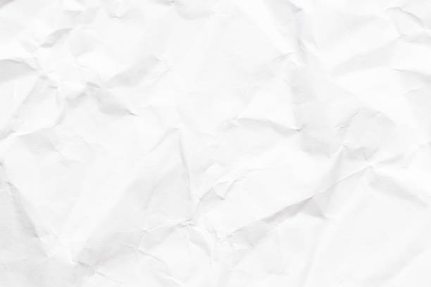 istock Grunge wrinkled white color paper textured background 1357902147
