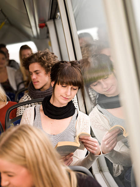 リーティングのバス - bus inside of people train ストックフォトと画像