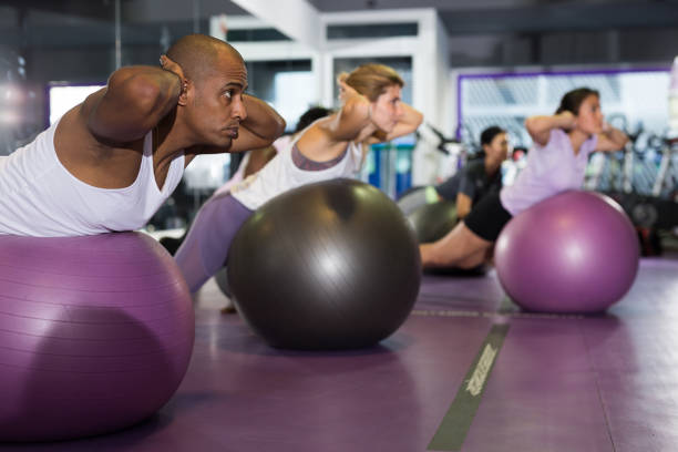 istock People working out with aerobic ball in  modern gym 1357913214
