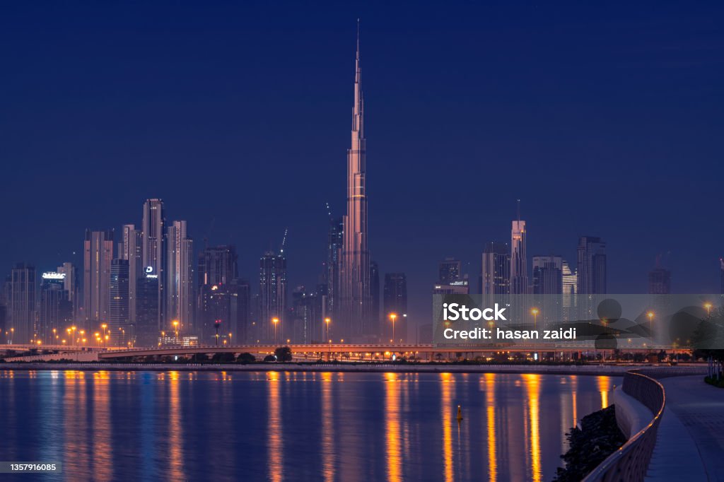 Dubai Skyline from Al Jadaf Panoramic view of the Dubai skyline with Burj khalifa and other sky scrapers from Al Jadaf Waterfront Dubai Middle East Stock Photo