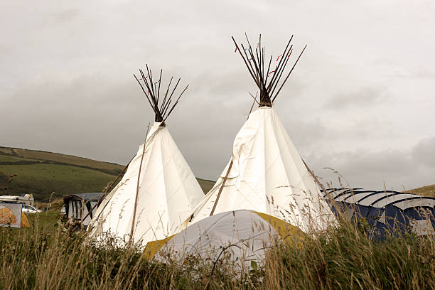 istock Two traditional teepees in campsite 135791650