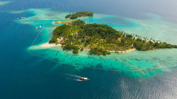 istock Tropical island with beach. Malipano island, Philippines, Samal 1357922788