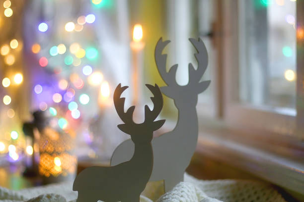 istock Reindeer Decorations and Colorful Bokeh 1357925768