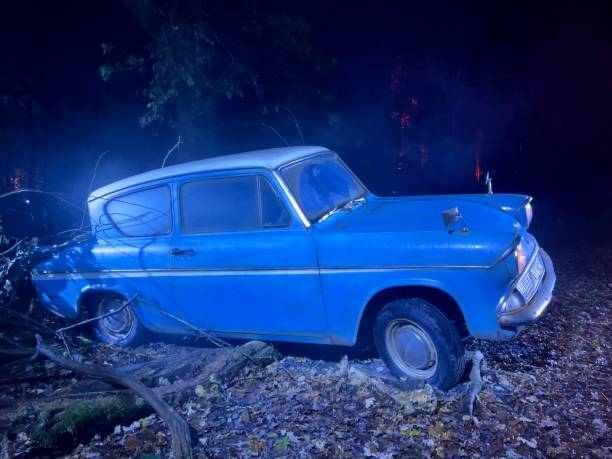 Abandoned car at night