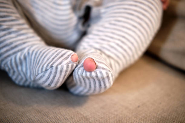 Close up bare foot in the morning at home, relaxing. Comfort aesthetics style