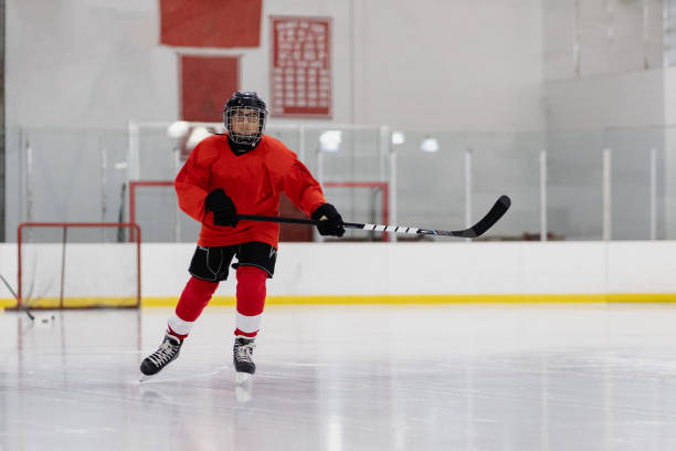 Boy Training Ice Hockey stock photo
