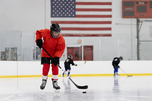 Boy Training Ice Hockey