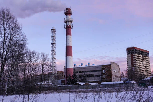 istock Winter view of a heating station with a smoking chimney 1357931746