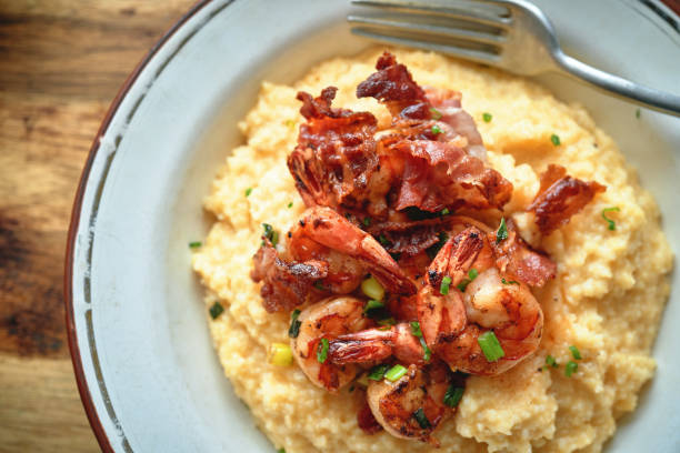 istock Creamy Grits with Fried Shrimps and Bacon 1357939157