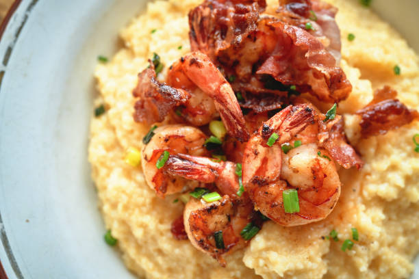 istock Creamy Grits with Fried Shrimps and Bacon 1357939195