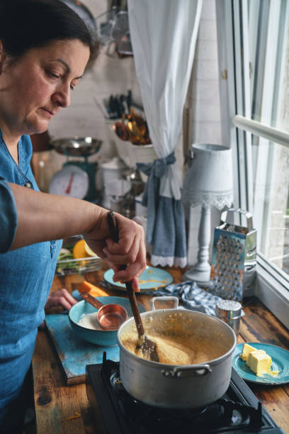 istock Preparing Shrimp and Grits in Domestic Kitchen 1357939228