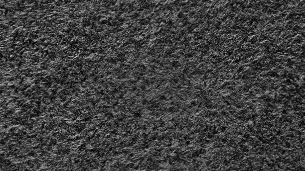 istock black metal background and texture 1357940443
