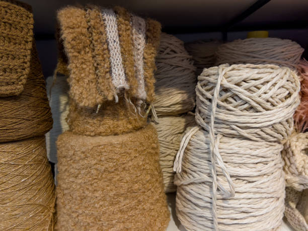 istock Set of wool yarn threads on bobbins 1357941038