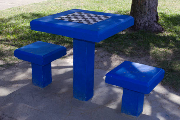 istock Square benches in city parks 1357943023
