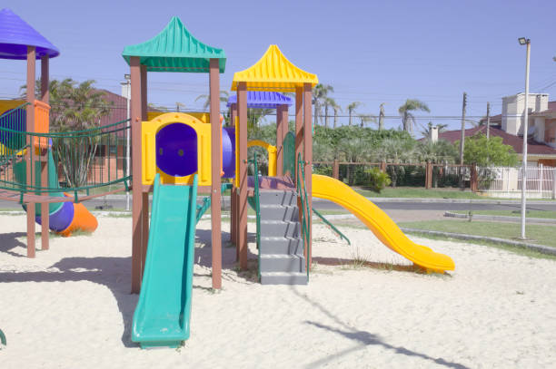 istock Children's slide in a city park 1357943253