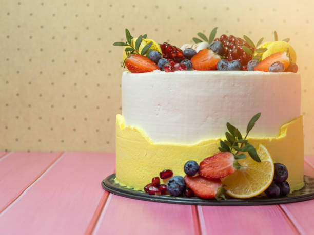 istock beautiful birthday cake decorated with berries with place for text 1357946211