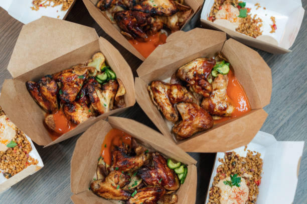 istock Chicken Wings Packed To take away 1357947325