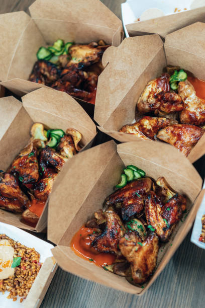 istock Chicken Wings Packed To take away 1357947327