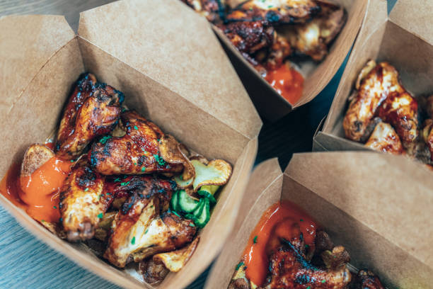 istock Chicken Wings Packed To take away 1357947328