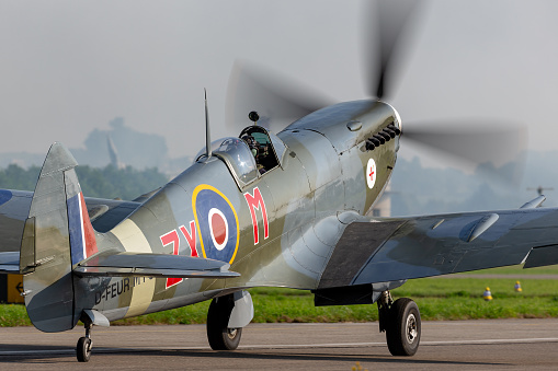Payerne, Switzerland - September 6, 2014: Supermarine Spitfire Mk.VIII World War II fighter aircraft D-FEUR taxiing at Payerne Airport.