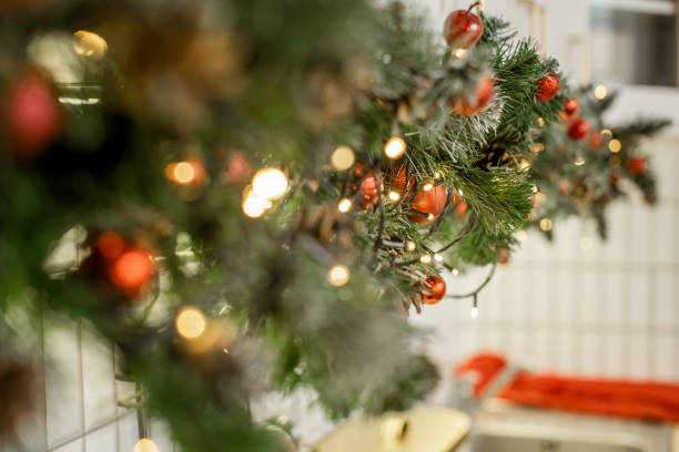 istock Christmas background with decorations and blurred lights on back. Selective focus 1357952712
