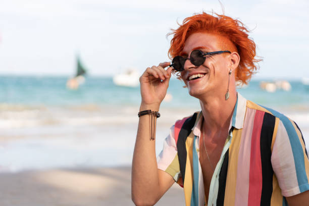 Portrait of young redhead on the beach Man, Redhead, Vacation, Beach, Summer lgbtqcollection stock pictures, royalty-free photos & images