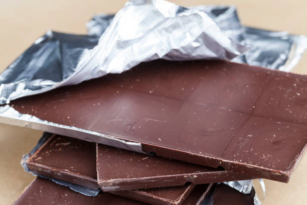 istock foil-packed chocolate bar made of cocoa and sugar 1357956594