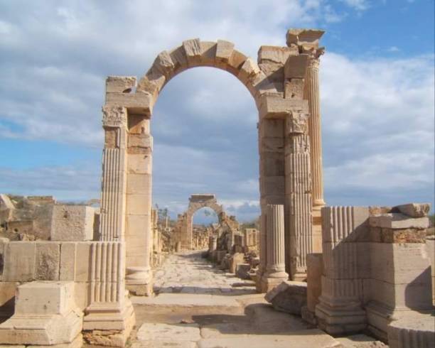 Arch of Tiberius, ancient Roman city of Leptis Magna, Tripoli, Libya stock photo