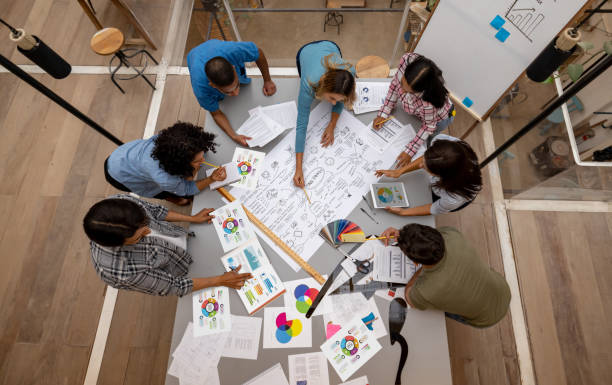 istock Business people at a creative office designing a marketing strategy 1357967950