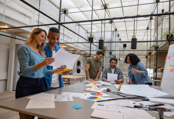 istock Group of business people working at a creative office 1357967951