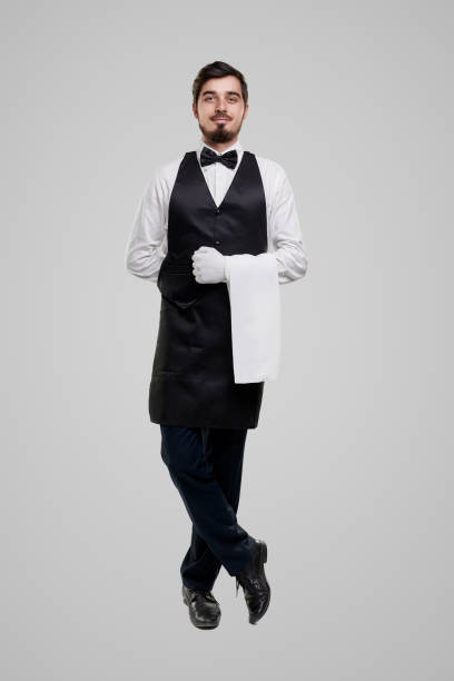 istock Professional male waiter with towel 1357969443