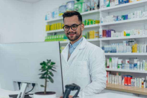 istock Portrait of a handsome pharmacist working in a pharmacy 1357969593