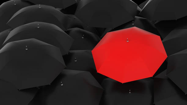 istock Many umbrellas one unique concept 1357969792