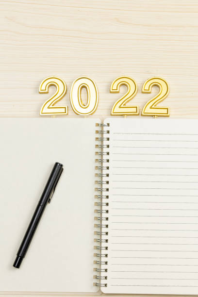 istock Notebooks and digital 2022 models on the desk 1357976418