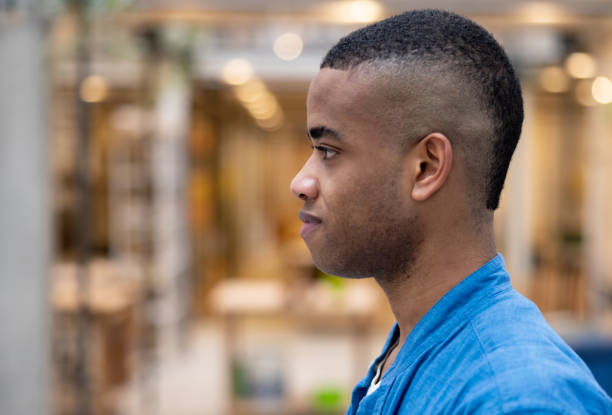 istock Young African American man working at an office 1357976496