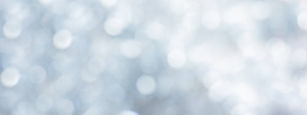 istock abstract blur beautiful silver metallic color background with circle bokeh light for christmas festival and happy new year 2022 season design as banner concept 1357991977
